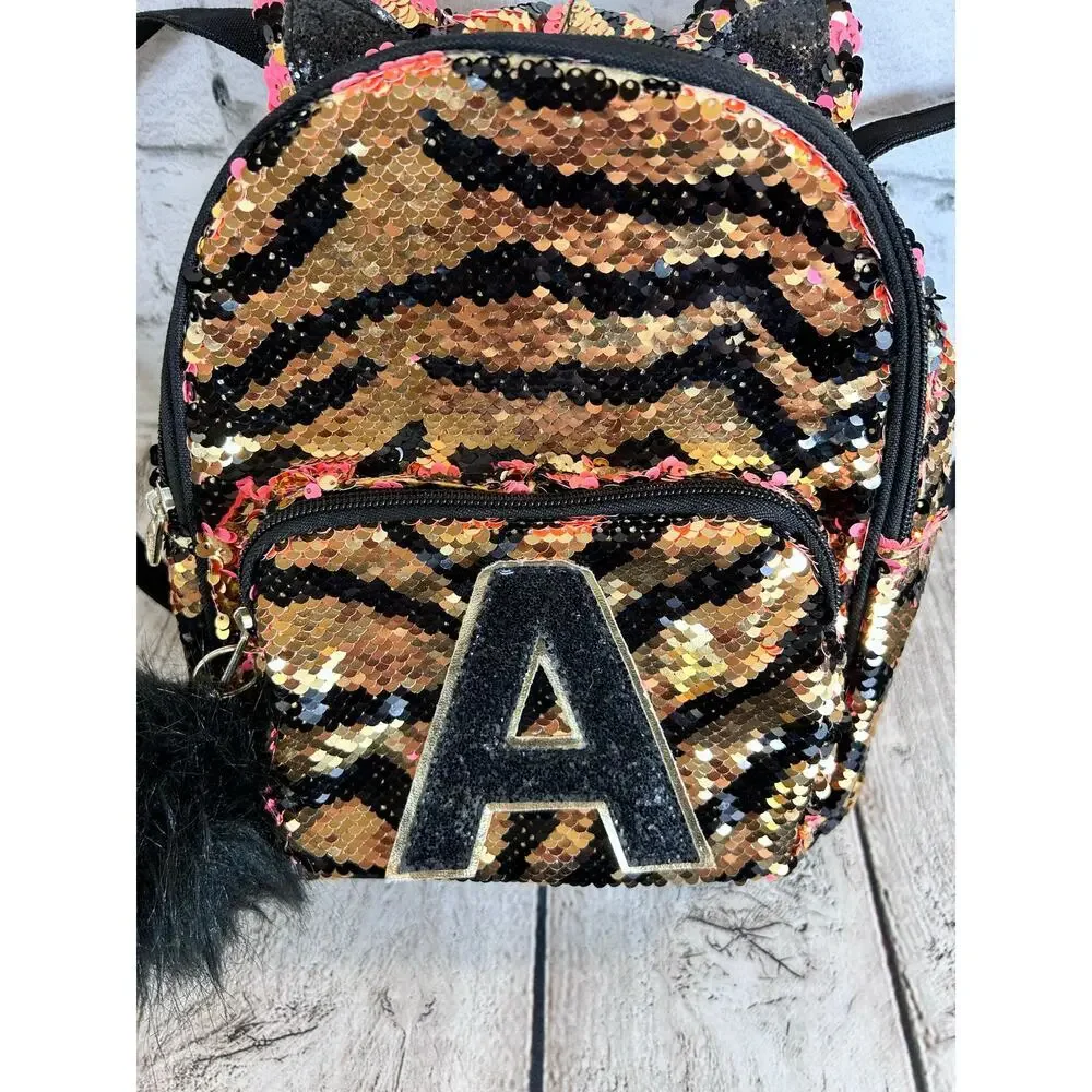 JUSTICE Girl’s Tiger Stripe Flip Sequin Mini Backpack with the Initial “A”